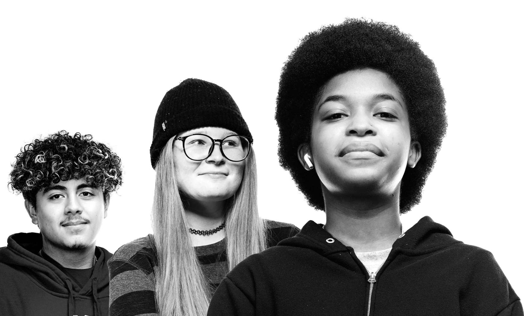 Three student heroes, black and white photography, looking at camera.