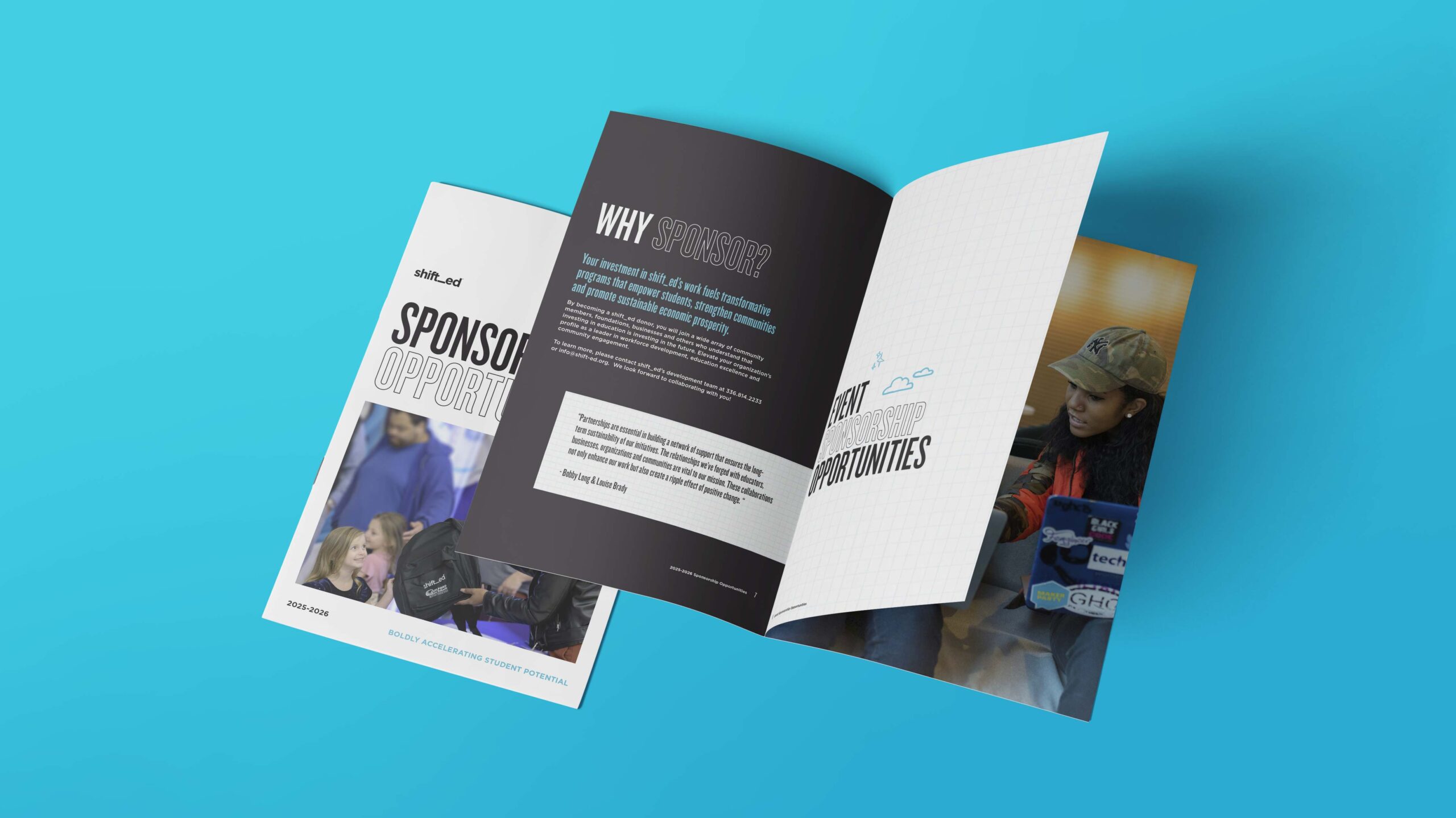 Picture of sponsorship brochure lying open on a blue surface